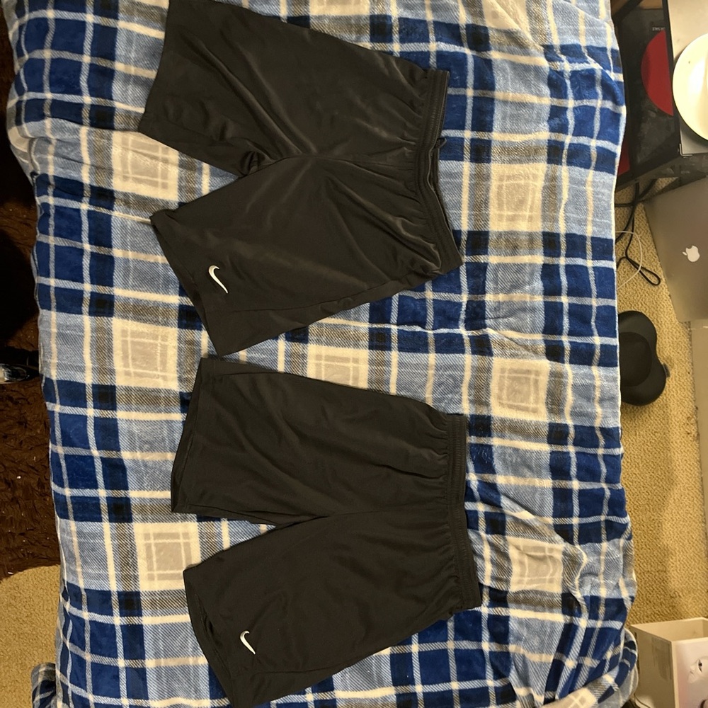 2 XL athletic Nike shorts in the color black